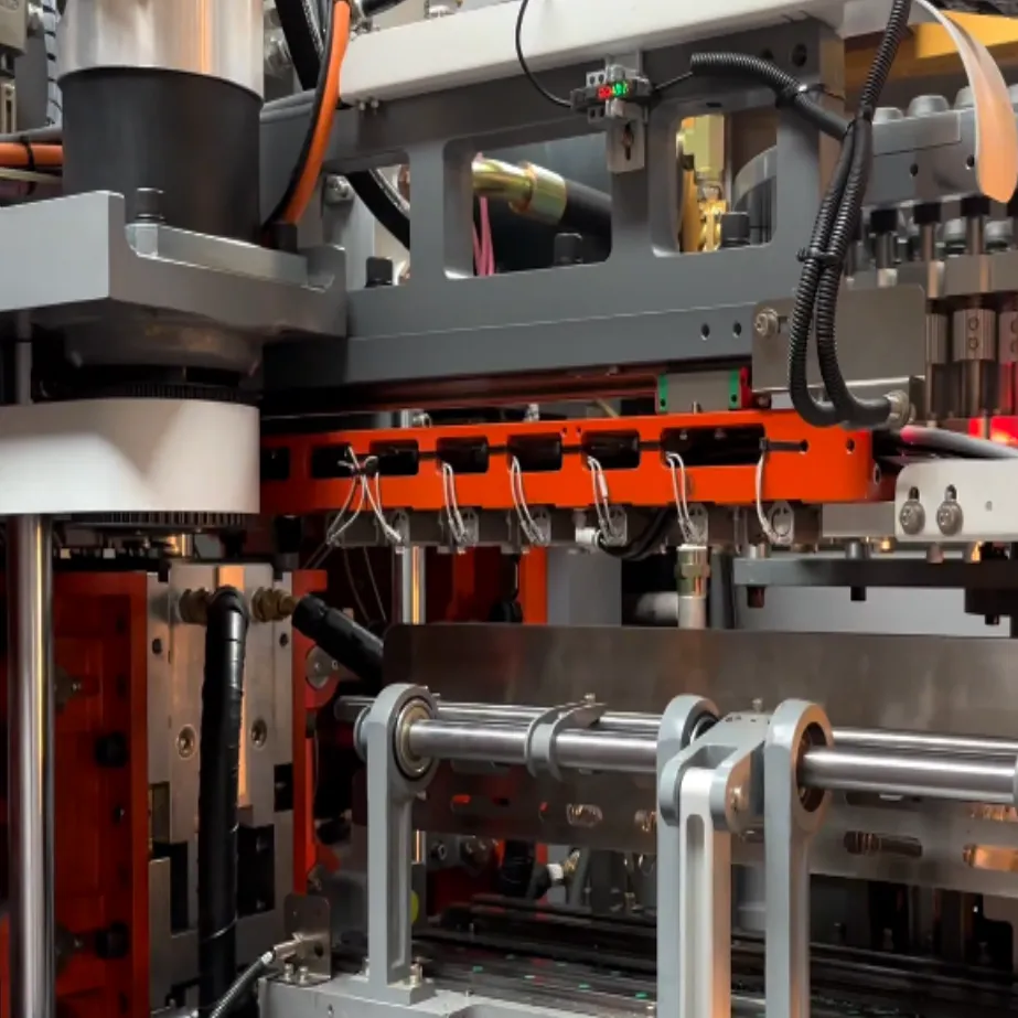 Hybrid auto blow molding machine LXG-7-40 SliderImage