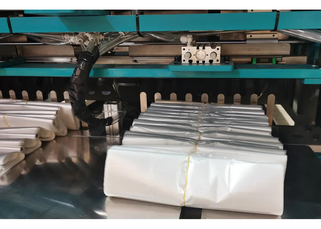  High Speed Carry Shopping T -Shirt Vest Bag Making Machine with Automatic Bag Folding and Strapping SliderImage